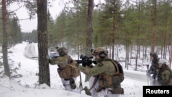 FILE - Norwegian Army soldiers attend training in Elverum, Norway, Nov. 21, 2019. 