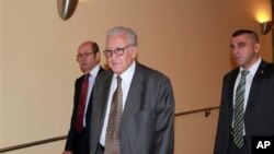 Lakhdar Brahimi, center, special representative for Syria, arrives at closed door Security Council consultations, U.N. headquarters, New York, Sept. 24, 2012.