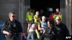 Des policiers déployés l’attaque par un véhicule-bélier à Münster, Allemagne, 7 avril 2018.