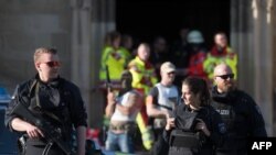 Des policiers déployés après l’attaque par un véhicule-bélier à Münster, Allemagne, 7 avril 2018.