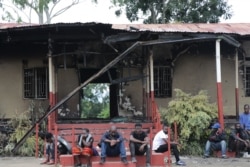 A hostel at Mapanga Prison Training School that was torched by returnees protesting poor living conditions there, Jan. 11, 2021. (Lameck Masina/VOA)