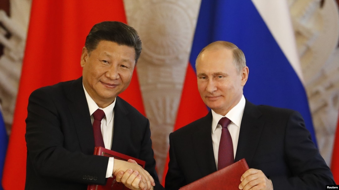 Vladimir Putin meets Xi Jinping
