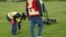 A crew performs a ground-penetrating radar search of a field where the Cowessess First Nation said they had found 751 unmarked graves, near the former Marieval Indian Residential School in Grayson, Saskatchewan, Canada, June 18, 2021.