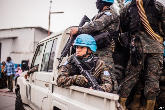 Guatemalan soldiers of the U.N. peacekeeping mission in the Democratic Republic of Congo secure the evacuation of U.N. civil personnel in Goma on Jan. 25, 2025.