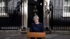 FILE - Britain's Prime Minister Theresa May speaks to the media outside her official residence of 10 Downing Street in London, April 18, 2017. 