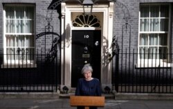 Britain's Prime Minister Theresa May speaks to the media outside her official residence of 10 Downing Street in London, April 18, 2017.