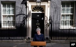 Britain's Prime Minister Theresa May speaks to the media outside her official residence of 10 Downing Street in London, April 18, 2017.