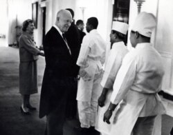 President Dwight D. Eisenhower and first lady Mamie Eisenhower say goodbye to the residence staff the day of President John F. Kennedy’s inauguration. (White House Historical Association)