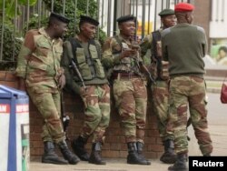 Soldiers are seen on the street in central Harare, Zimbabwe, Nov. 16, 2017.