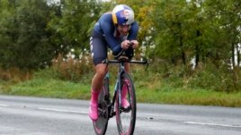 FILE - In this Sept. 24, 2019, file photo, Chloe Dygert, of the United States, competes in the women's elite individual time trial event at the road cycling World Championships in Harrogate, England. (AP Photo/Manu Fernandez, File)