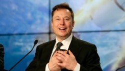 Elon Musk founder, CEO, and chief engineer/designer of SpaceX speaks during a news conference after a Falcon 9 SpaceX rocket test flight to demonstrate the capsule's emergency escape system at the Kennedy Space Center in Cape Canaveral, Fla., Sunday, Jan.
