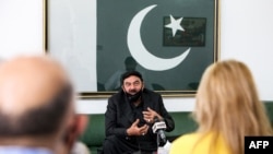 Pakistan's Interior Minister Sheikh Rasheed Ahmed speaks to reporters at the Pakistani embassy in Kuwait City on May 31, 2021.
