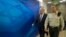 Israel's Prime Minister Benjamin Netanyahu, left, arrives for the weekly cabinet meeting in Jerusalem, Feb. 15, 2015. 