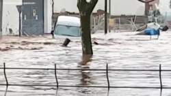 Video Shows Car Being Swept Away by Floodwaters in Spain