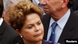 Brazil's President Dilma Rousseff attends the wake of late Brazilian presidential candidate Eduardo Campos inside the Pernambuco Government Palace in Recife, Aug. 17, 2014.