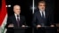 Iraq's Deputy Prime Minister for Energy Hussain al-Shahristani (L) speaks during a joint news conference with Turkey's Energy Minister Taner Yildiz in Baghdad, Dec. 1, 2013. 