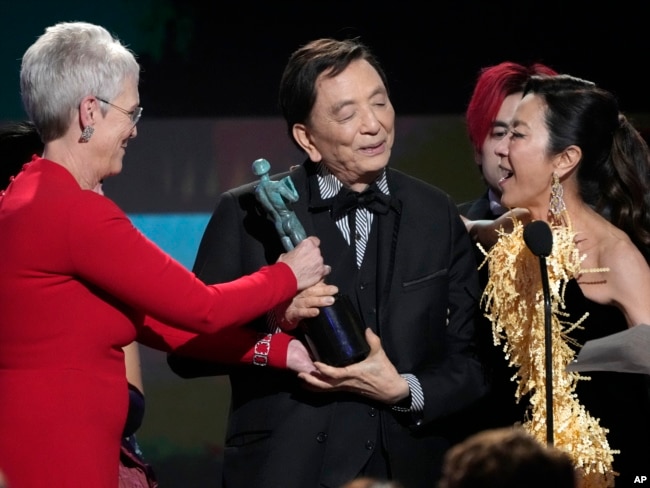 Jamie Lee Curtis, James Hong and Michelle Yeoh celebrate their wins. (AP/Chris Pizzello)