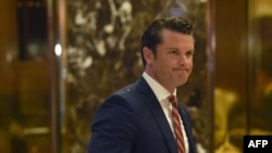 FILE - Pete Hegseth arrives at Trump Tower for a meeting with President-elect Donald Trump in New York, on Nov. 29, 2016.