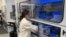 Scientists and researchers work on a potential vaccine for the coronavirus disease (COVID-19) at Pfizer's laboratory