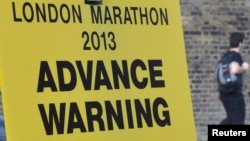 A road closure sign is seen placed along The Mall, the location for the London Marathon finish line, in central London, April 16, 2013.