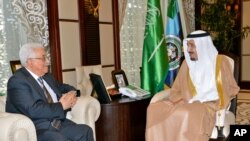 Palestinian President Mahmoud Abbas, left, meets with Saudi Arabia's Crown Prince Salman bin Abdulaziz in Jeddah, Saudi Arabia, Wednesday, June 18, 2014. Abbas said his forces are helping in the search for three Israeli teens missing in the West Bank.