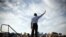 President Barack Obama waves to supporters during a campaign event at McArthur High School, Hollywood, Florida, November 4, 2012.