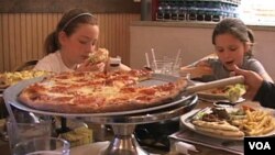 Young diners enjoy a meal at the Primo Family Restaurant in Alexandria, Virginia