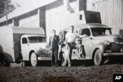 As a young man, Hugh Tracey (far right) had to transport his recording equipment across Africa in a convoy of trucks