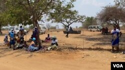 Patients wait for service outside Chesa Rural Clinic in Mount Darwin district, about 200 km north of Harare, Nov. 04, 2021. The government is opening more such clinics to help people with conditions like diabetes. (Columbus Mavhunga/VOA)