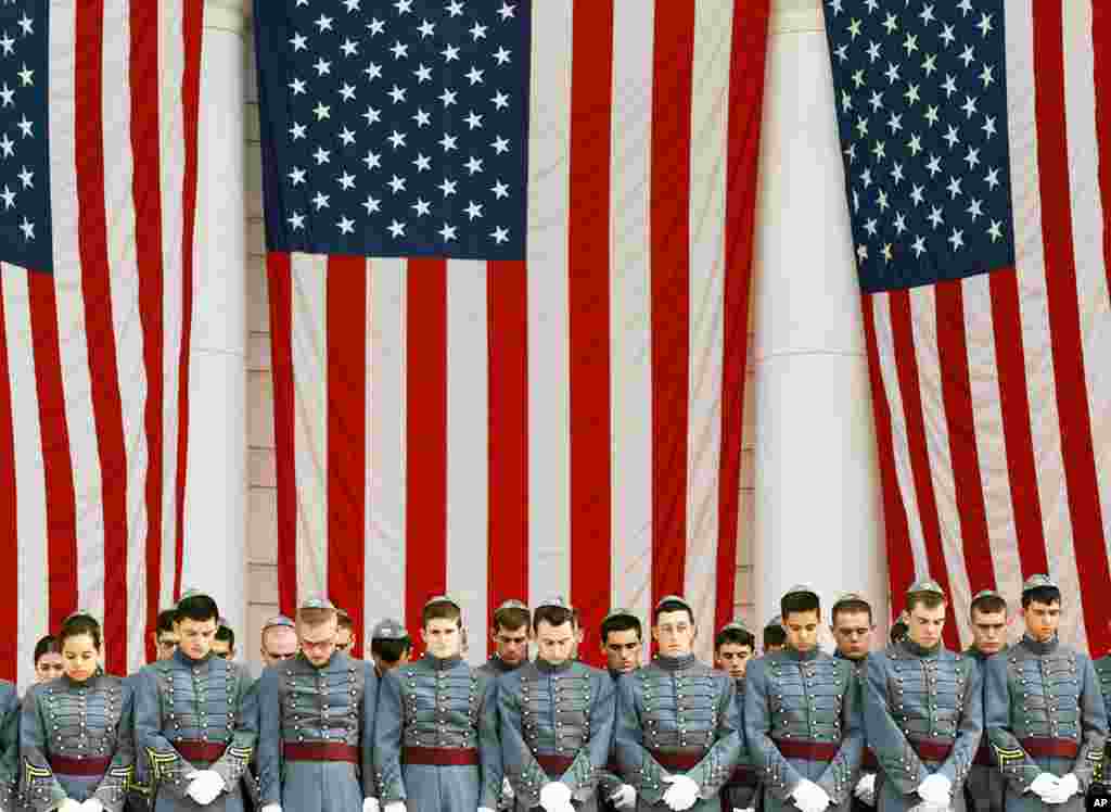 Members of a Military Cadet school in a moment of silence during the memorial dedication for the 14 Jewish chaplains who have died in service, Oct. 24, 2011, at Arlington Cemetery. (AP Photo)