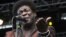 FILE - Soul singer Charles Bradley performs at the Shaky Knees Music Festival in Atlanta, Ga., May 9, 2014. His publicist said Bradley died Saturday after a battle with stomach cancer.