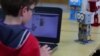 Children Learn to Program Toy Robots