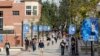 FILE - Students make their way across the UCLA campus in Los Angeles, Feb. 26, 2015. University of California officials have proposed limiting nonresident enrollment all undergraduate students, in an effort to prioritize in-state applicants.