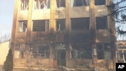 In this photo released by Bulgarian Interior Ministry, a municipality building is seen after an explosion following a train derailment in the village of Hitrino in Bulgaria, Dec 10, 2016. 