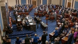 In this image from video, Sen. Patrick Leahy, D-Vt., the president pro tempore of the Senate, who is presiding over the impeachment trial of former President Donald Trump, swears in members of the Senate for the impeachment trial at the U.S. Capitol.