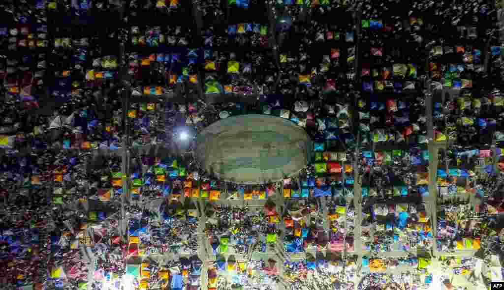 Thousands of pilgrims sleep at the Guadalupe Basilica during a procession in Mexico City to mark the birthday of the Guadalupe Virgin.