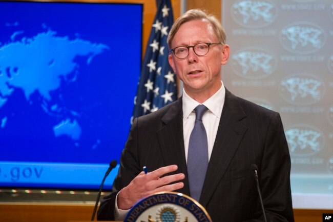 FILE - Brian Hook, special representative for Iran, speaks about the creation of the Iran Action Group at the State Department, in Washington, Aug. 16, 2018.
