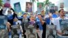 People hold pictures of protesters who died during demonstrations against Nicaraguan President Daniel Ortega's government during the previous year in Managua, Nicaragua, on November 2, 2019. (Oswaldo Rivas/Reuters) 