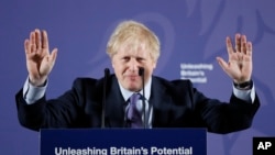 British Prime Minister Boris Johnson outlines his government's negotiating stance with the European Union after Brexit, during a key speech at the Old Naval College in Greenwich, London, Feb. 3, 2020. 