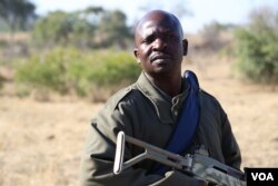 Ranger Lawrence Baloi says his job has changed from focusing on conservation to security. "You need your heart to do this," he says about his risky job. (Photo: Gillian Parker for VOA)