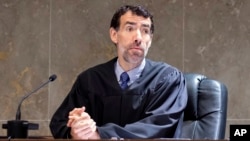 FILE - Fulton County Superior Court Judge Robert McBurney instructs potential jurors during proceedings on May 2, 2022, in Atlanta. On Sept. 30, 2024, McBurney's ruling struck down the state's near-ban on abortion.