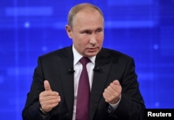 Russian President Vladimir Putin speaks during an annual nationwide televised phone-in show in Moscow, June 20, 2019.