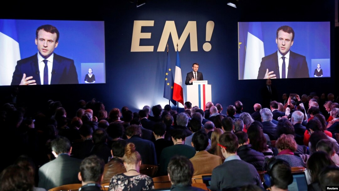 Emmanuel Macron, head of the political movement En Marche !, or Onwards !, and candidate for the 2017 French presidential election, speaks during a Paris news conference to unveil his budget manifesto, March 2, 2017.