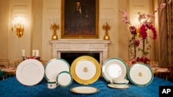 The White House displays the china set for Tuesday's State Dinner hosted by President Barack Obama for Japanese Prime Minister Shinzo Abe, in the State Dining Room of the White House, in Washington, April 27, 2015. 