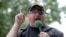 FILE - In this June 25, 2017, photo, Stewart Rhodes, founder of the citizen militia group known as the Oath Keepers, speaks during a rally outside the White House in Washington. 