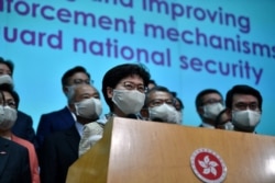 香港特首林郑月娥在北京人大会堂出席全国政协年度会议开幕式后回到香港举行记者会。（2020年5月22日）