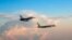 台灣國防部公佈的資料照顯示一架台灣軍機與大陸戰機近距離並飛。(2018年5月28日)