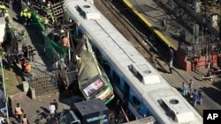 View of a crash between two passenger trains and a bus in Buenos Aires, Argentina, Sept. 13, 2011.