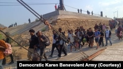 More than 260 foreign nationals — from the Philippines, Bangladesh, Brazil, Nepal, Kenya, Laos, Ethiopia, Pakistan, Tanzania, Sri Lanka, Uganda, and Taiwan — were rescued and transferred by the Democratic Karen Benevolent Army to Thai authorities. (Courtesy - DKBA)