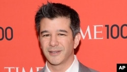FILE - Uber CEO Travis Kalanick arrives at the 2014 TIME 100 Gala in New York. 